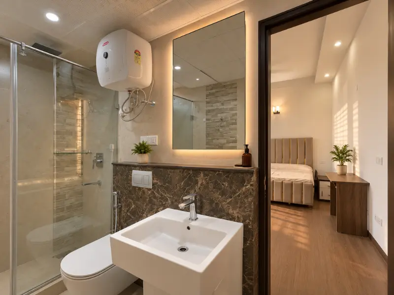 Modern bathroom with vanity and glass shower — 2 BHK apartment for sale at Nova Residences, Sector 94 Noida