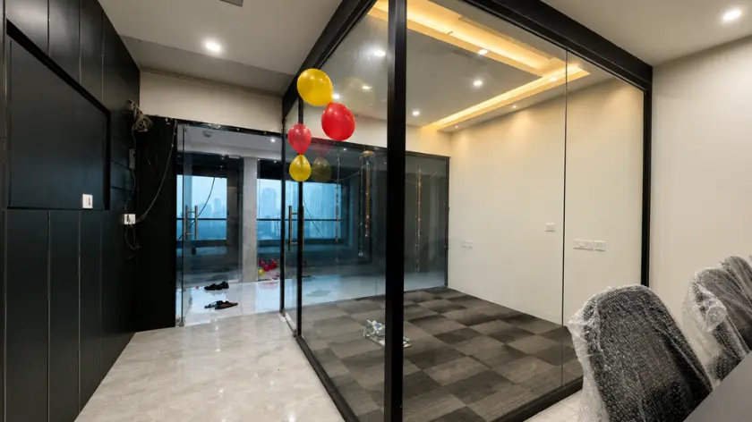 Executive cabin with table and chairs in the 514 sq ft Astralis office