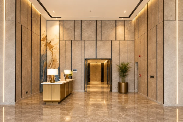 Double-height marble reception lobby at Kalpataru Vista Sector 128 Noida