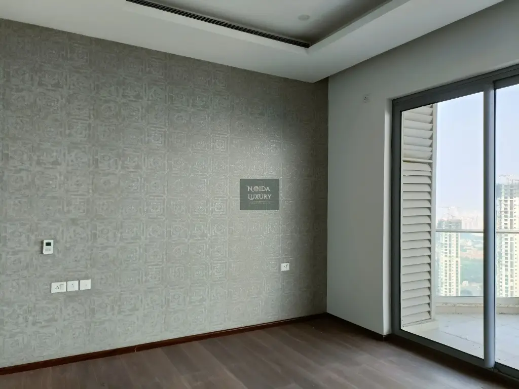 Penthouse for sale in Noida — semi-furnished penthouse with modern kitchen and access to clubhouse