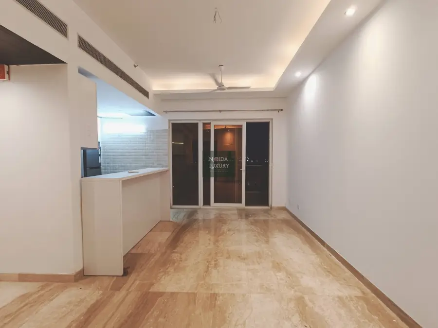 Resale 2BHK flat in Noida — bright rooms, modern kitchen and access to resident clubhouse and gym