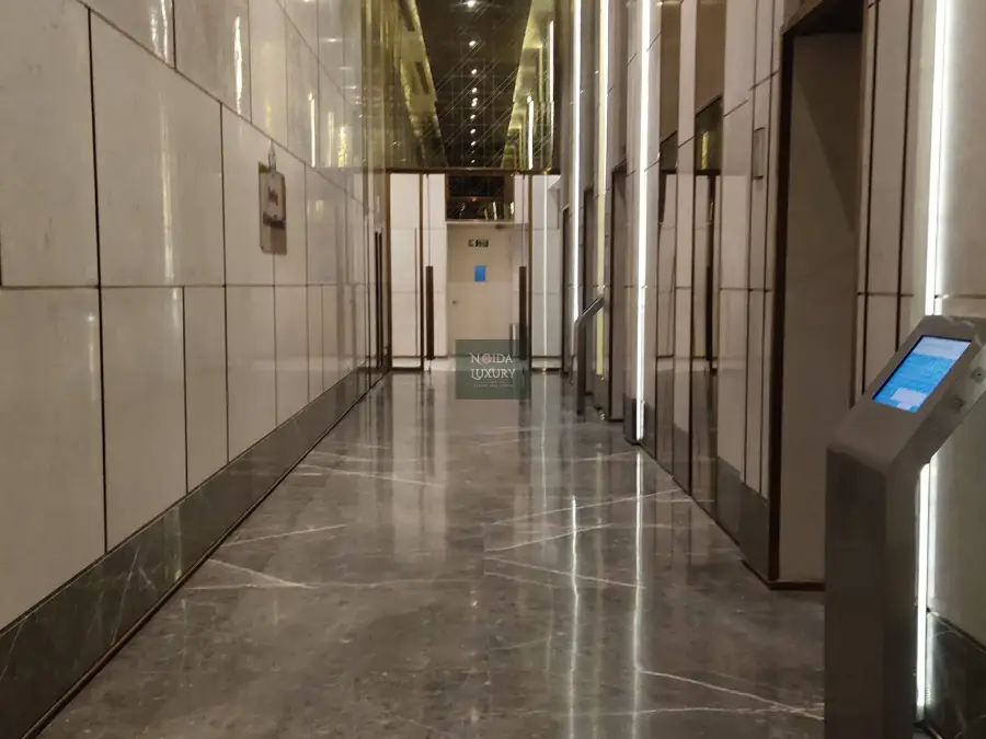 3 BHK flat in Supernova Noida — living area and balcony with clubhouse & parking facilities