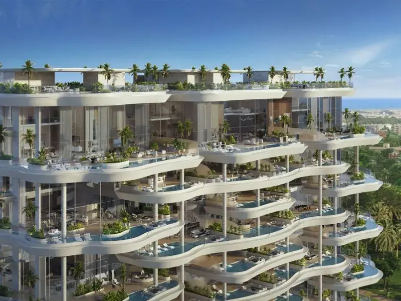 Ultra luxury apartments in Noida featuring expansive balconies, modern glass facade and premium lifestyle amenities